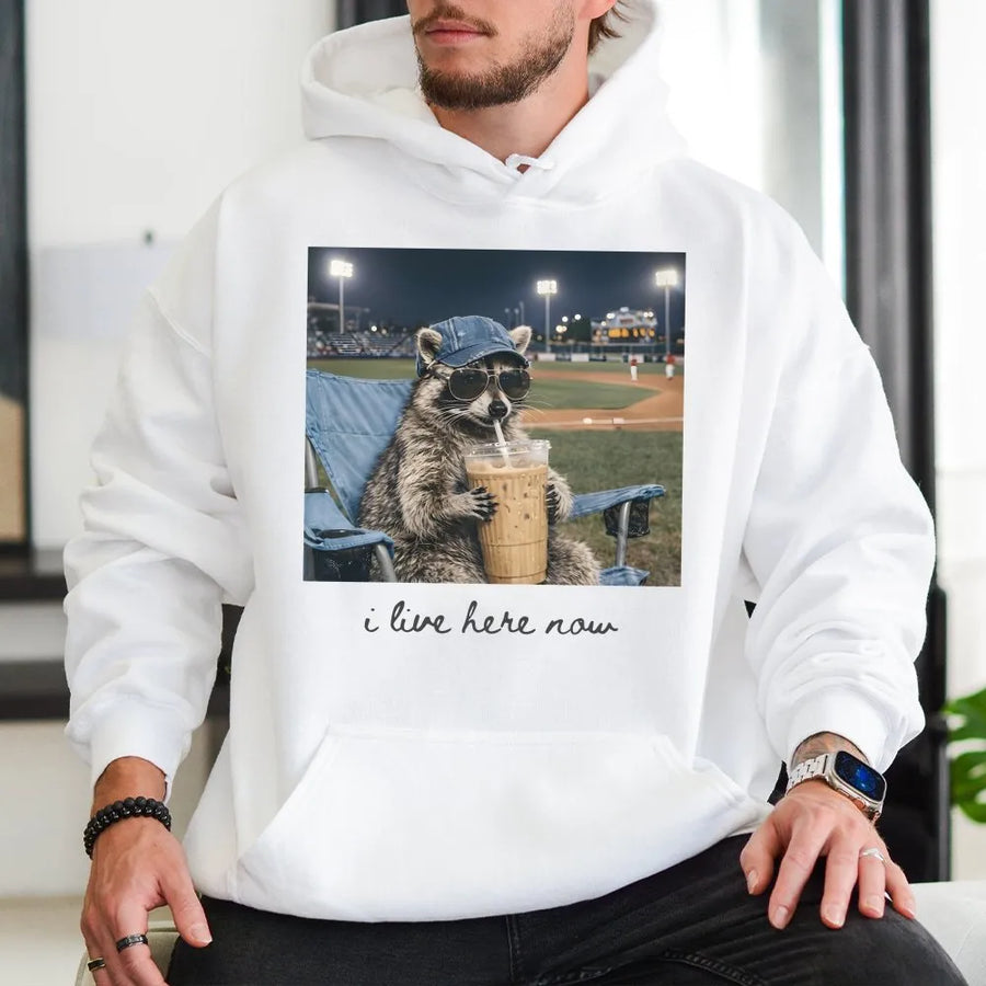 Raccoon Baseball Hoodie | Funny I Live Here Now Graphic | Premium Cotton Blend | Baseball Mom Gift for Softball Tournament Enthusiasts