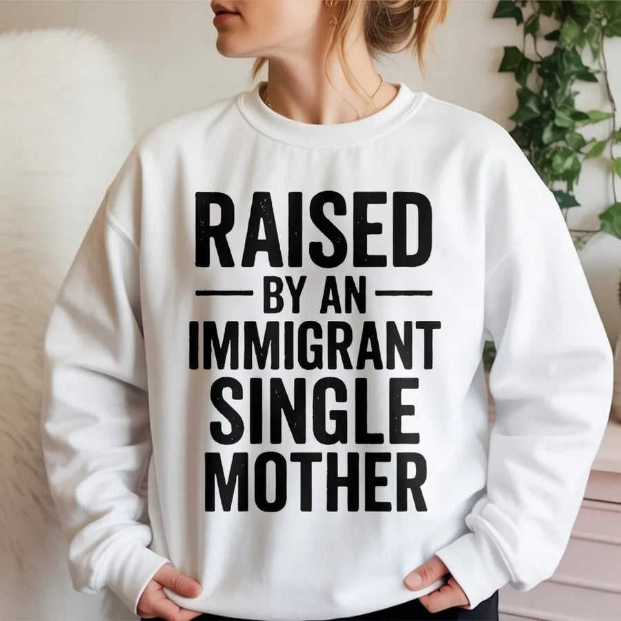 Raised By An Immigrant Single Mother Sweatshirt | Empowering Typography Graphic | Premium Cotton Blend | Meaningful Gift For First Gen Women