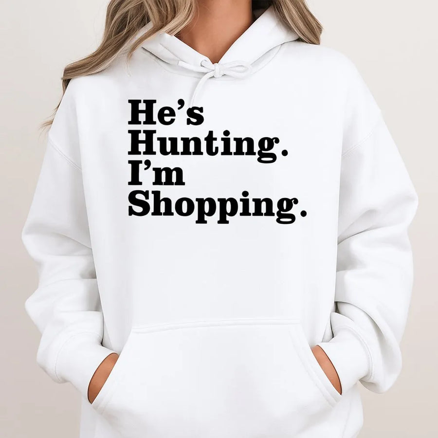 He's Hunting I'm Shopping Hoodie | Funny Country Life Graphic Sweatshirt | Premium Cotton Blend Apparel | Gift for Hunter Wife Girlfriend