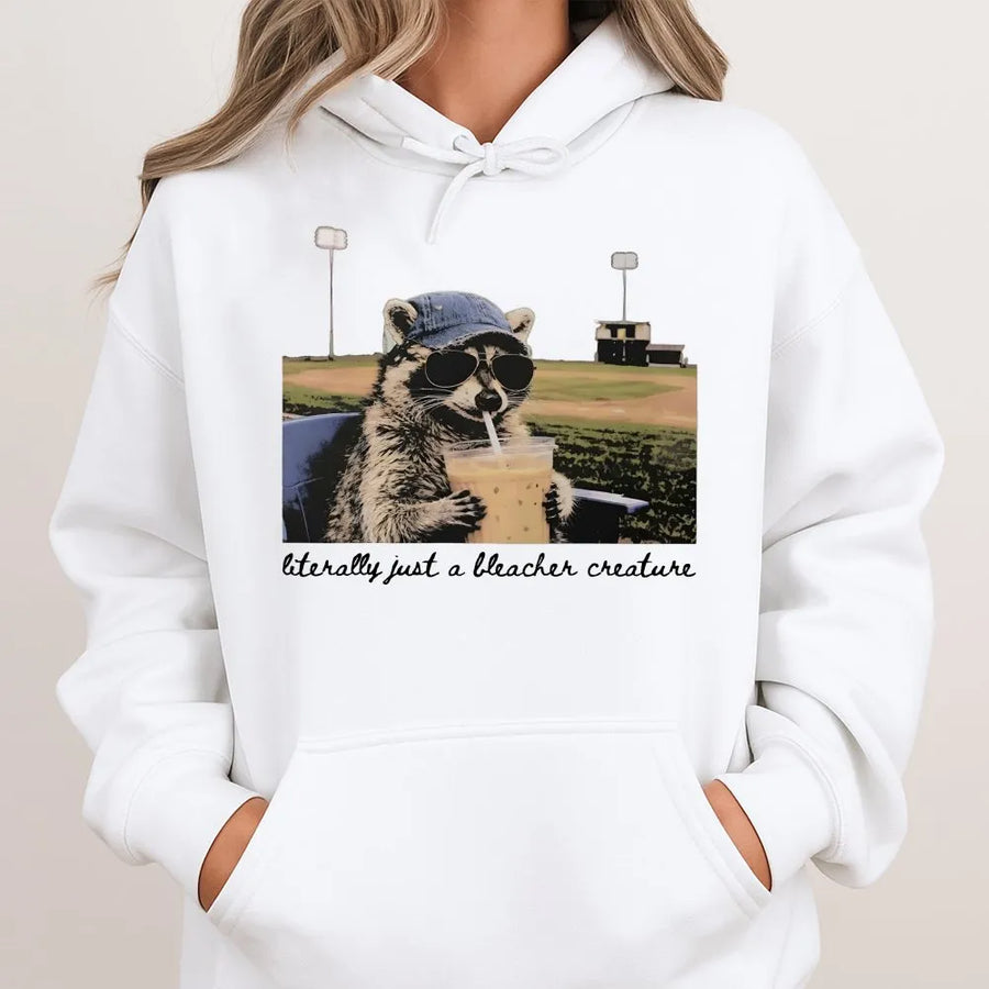 Bleacher Creature Raccoon Hoodie | Baseball Mom Gift | Cotton Blend Pullover | Funny Sports Fan Apparel for Baseball and Softball Season