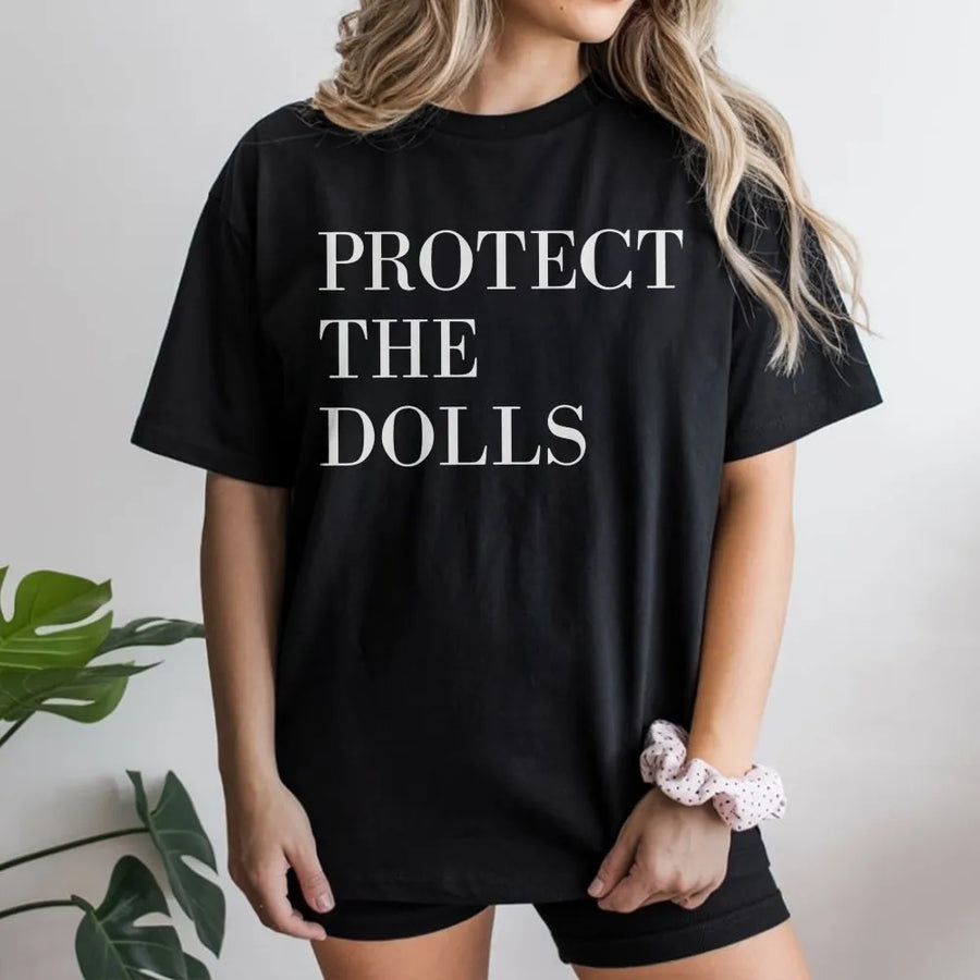 Protect The Dolls T-Shirt | Minimalist Typographic Activism Design | Premium Soft Cotton | Gender Equality LGBTQ Pride Gift For Allies