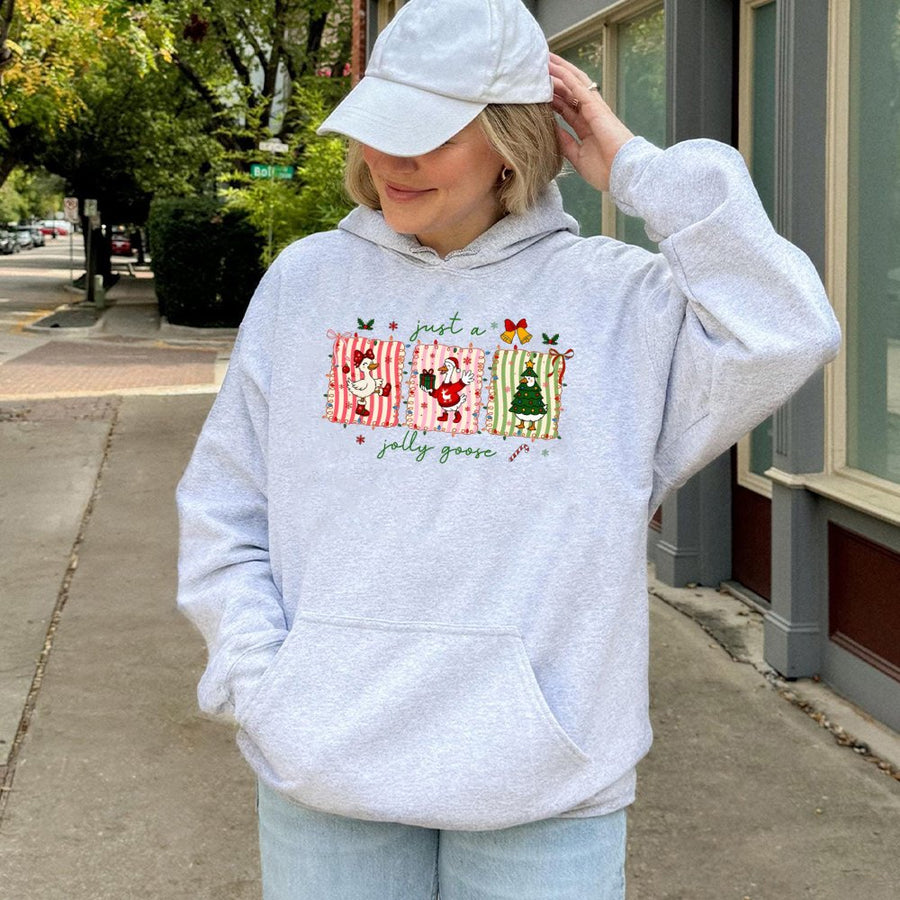 Jolly Goose Christmas Hoodie | Cute Santa Duck Holiday Graphic | Soft Cotton Blend Sweatshirt | Funny Winter Gift for Goose Lovers