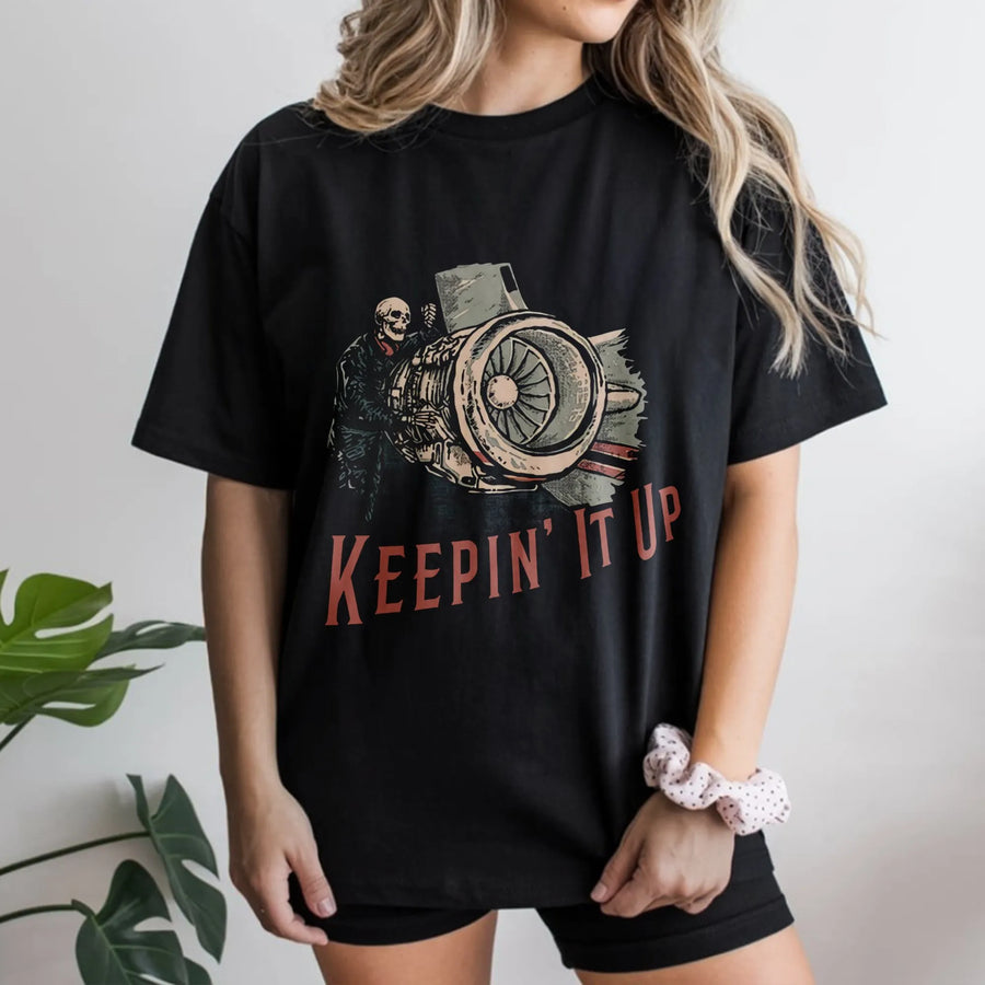 Aircraft Mechanic T-Shirt | Keepin' It Up Jet Engine Skeleton Graphic | Premium Cotton Aviation Tee | Funny Aerospace Maintenance Engineer Gift