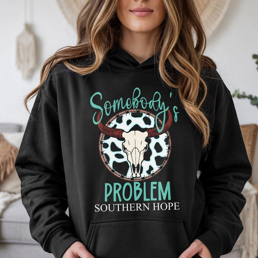 Somebody's Problem Cow Skull Hoodie | Western Country Aesthetic Graphic | Soft Cotton-Poly Blend | Premium Gift for Southern Women and Cowgirls