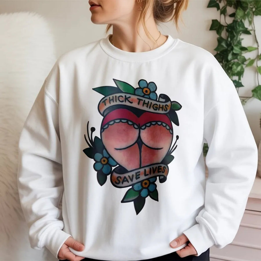 Thick Thighs Save Lives Sweatshirt | Traditional Tattoo Flash Art | Premium Cotton Blend Unisex Crewneck | Funny Graphic Apparel Gift for Him Her