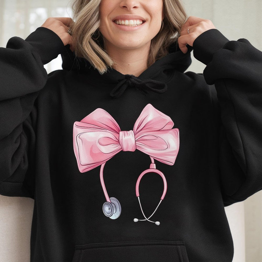 Coquette Nurse Stethoscope Hoodie | Cute Pink Bow Graphic Aesthetic | Soft Cotton-Blend Pullover | Nursing Student Gift & Appreciation Sweatshirt
