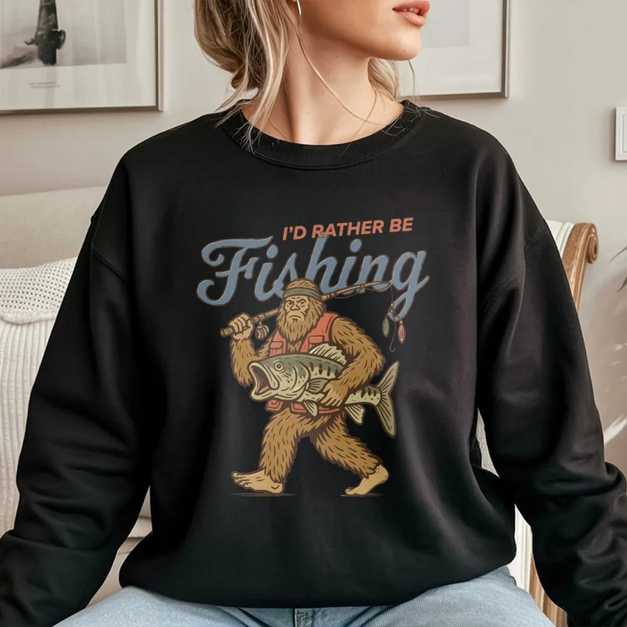 Sasquatch Fishing Sweatshirt | Retro I'd Rather Be Fishing Graphic | Premium Cotton Blend | Funny Gift for Fisherman and Cryptid Lovers