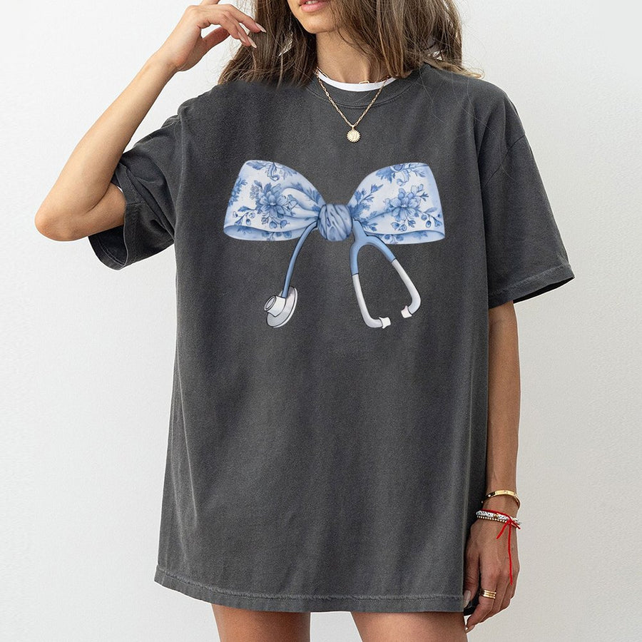 Nurse T-Shirt | Floral Coquette Bow Stethoscope Design | Premium Cotton Tee | Cute Nursing School Gift for RN LPN Student