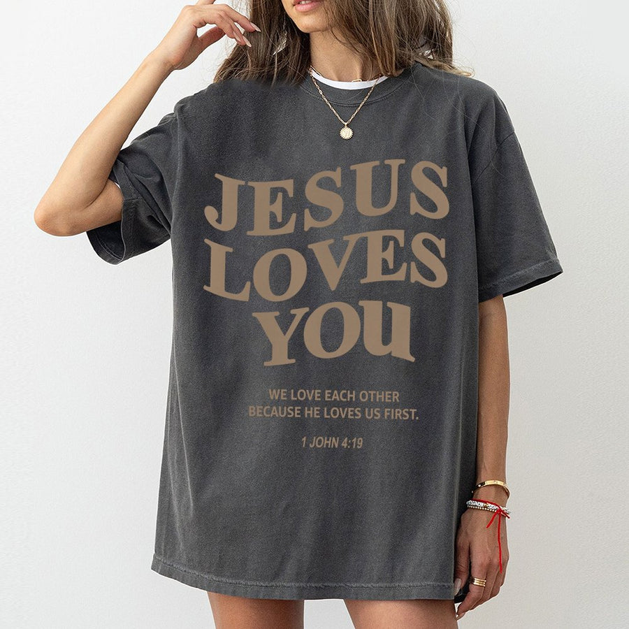Jesus Loves You T-Shirt | 1 John 4:19 Bible Verse Graphic | Premium Cotton Unisex Tee | Religious Christian Gift for Men and Women