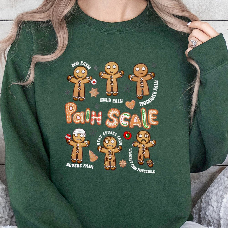 Funny Gingerbread Pain Scale Sweatshirt | Cute Christmas Nurse Graphic Tee | Premium Cotton Blend Crewneck | Holiday Gift for Nurses & Medical Staff