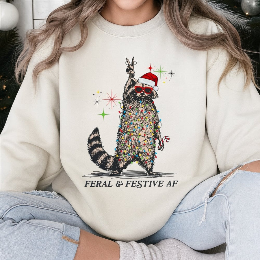 Feral & Festive AF Raccoon Sweatshirt | Funny Christmas Lights Graphic | Premium Cotton-Poly Blend | Unisex Holiday Gift for Raccoon Lovers