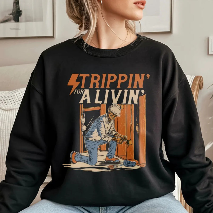 Electrician Sweatshirt | Strippin' For A Livin' Skeleton Graphic | Premium Cotton Blend Pullover | Funny Blue Collar Trade Job Gift For Him