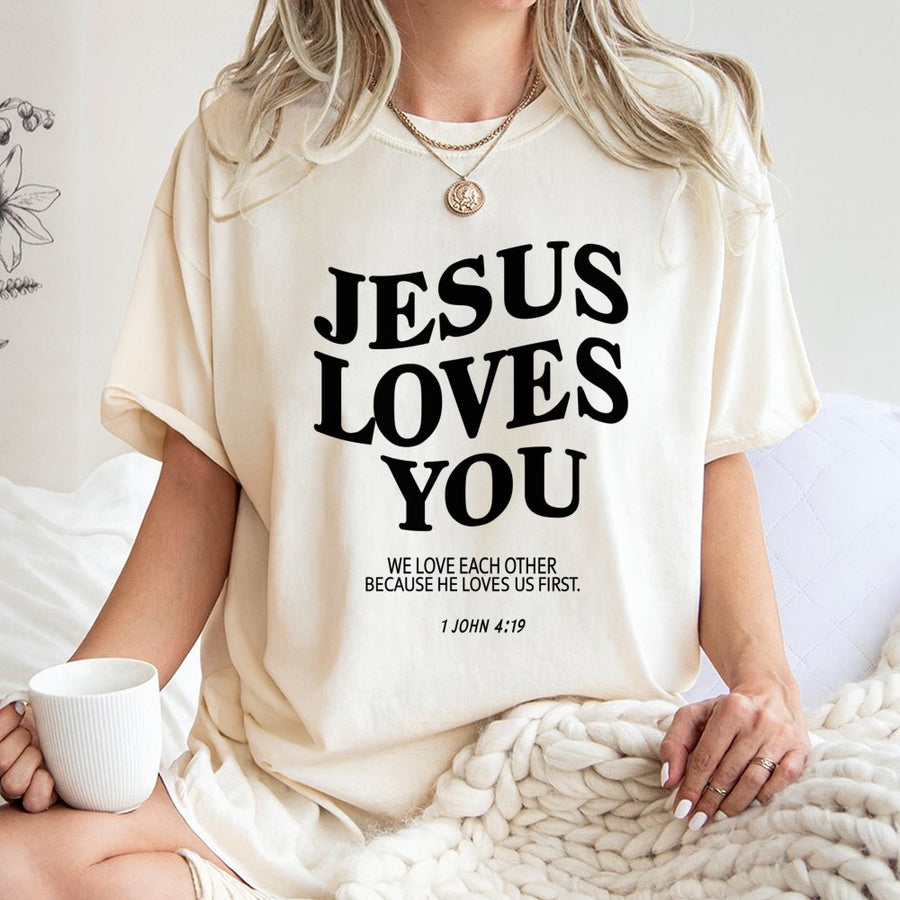 Jesus Loves You T-Shirt | 1 John 4:19 Bible Verse Scripture Design | 100% Cotton Premium Tee | Christian Faith Gift For Men And Women