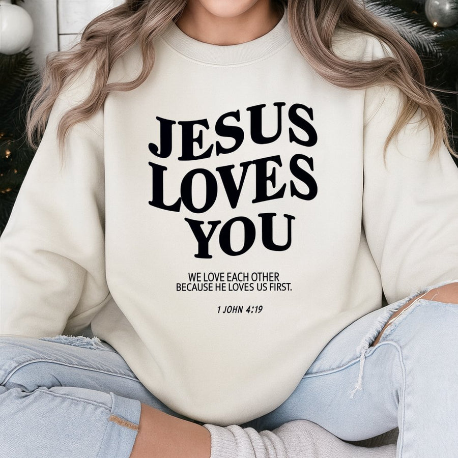 Jesus Loves You Sweatshirt | 1 John 4:19 Bible Verse Graphic | Premium Cotton Blend | Christian Faith Gift for Him and Her