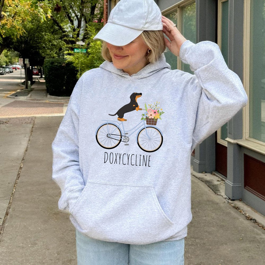 Dachshund Hoodie | Doxycycline Pharmacy Pun Graphic | Premium Cotton Blend | Gift for Pharmacist, Pharmacy Technician or Dog Lover
