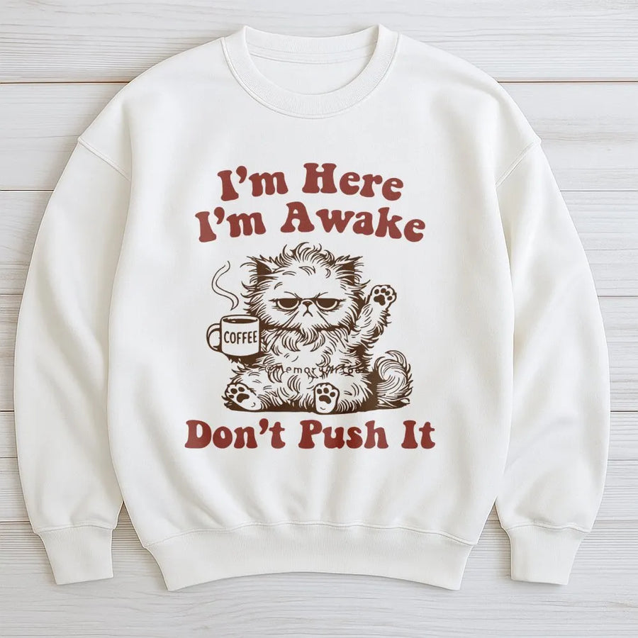 I'm Here I'm Awake Don't Push It Sweatshirt | Funny Grumpy Cat Coffee Graphic | Premium Cotton Blend Crewneck | Sarcastic Gift for Coffee Lovers