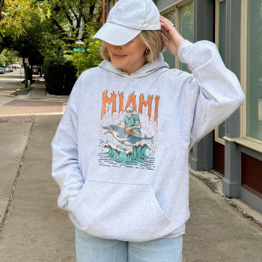 Miami With Skeleton Riding A Dolphin In A Football Jersey Hoodie