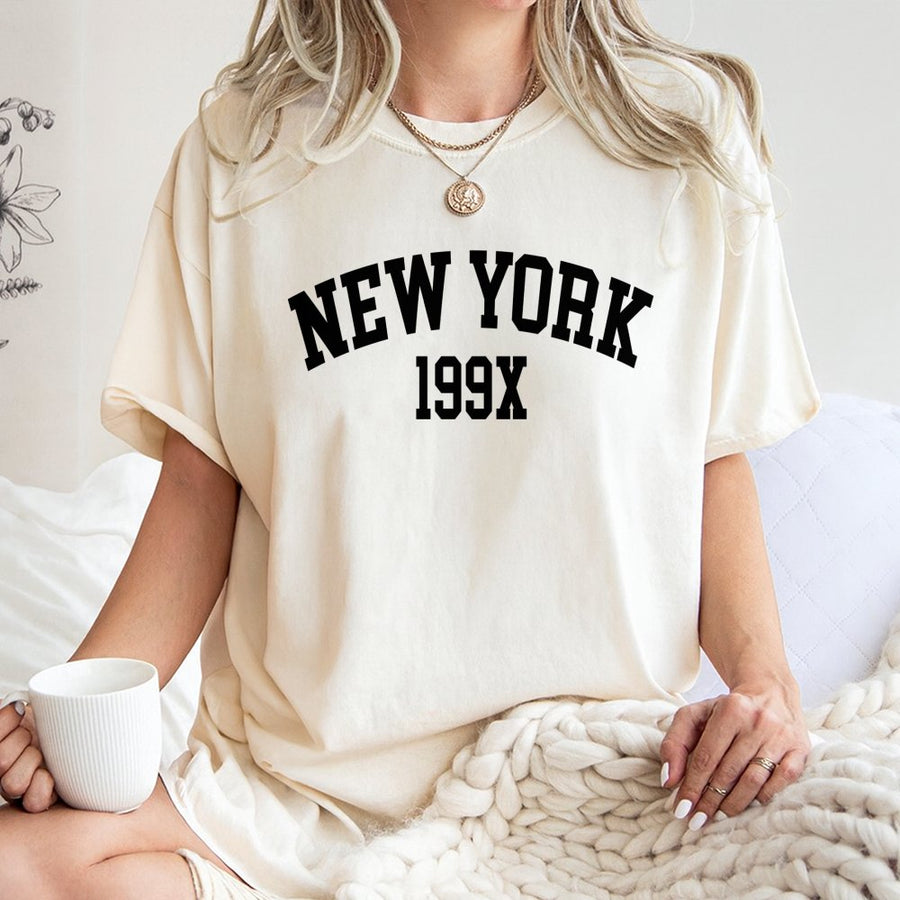 New York 199X Graphic T-Shirt | Retro Varsity Lettering | 100% Cotton Premium Tee | Vintage Aesthetic Gift for Men and Women
