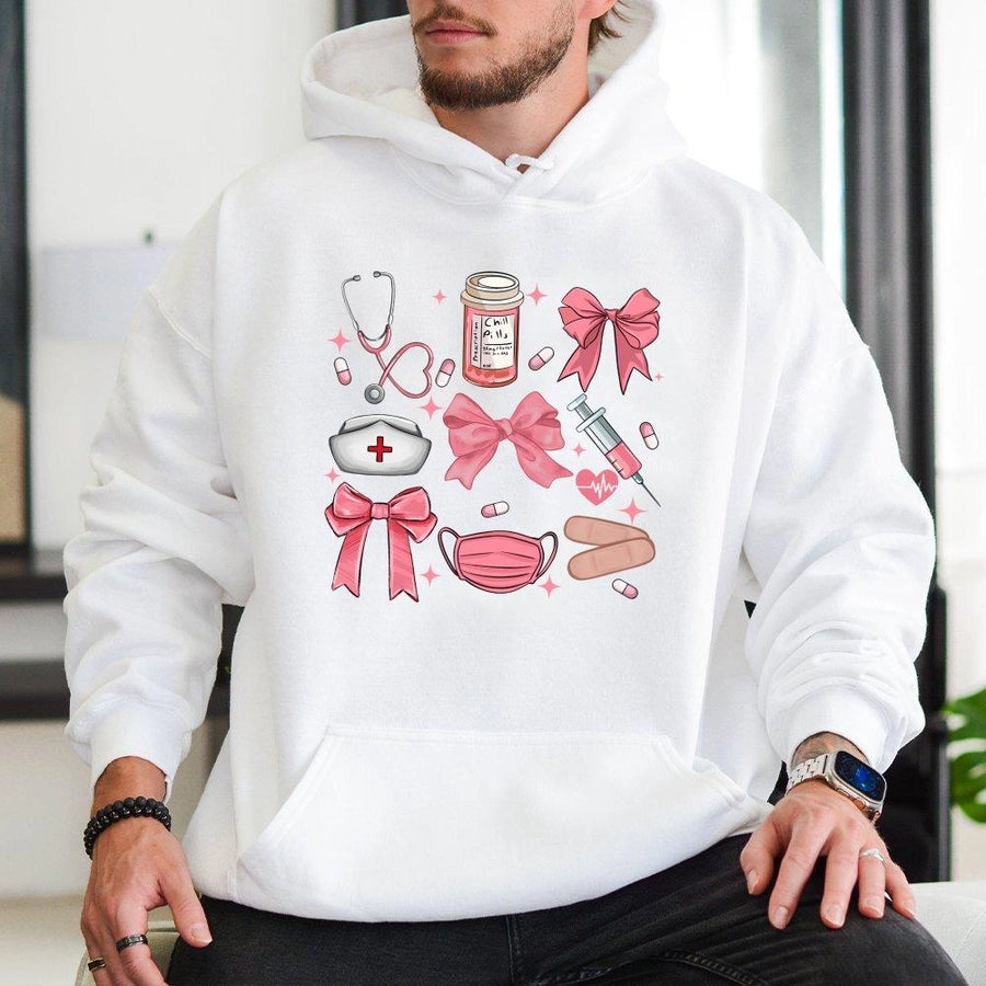 Coquette Nurse Hoodie | Aesthetic Medical Pink Bow Graphic | Soft Cotton-Blend Pullover | Cute Nursing School Student Gift for Her