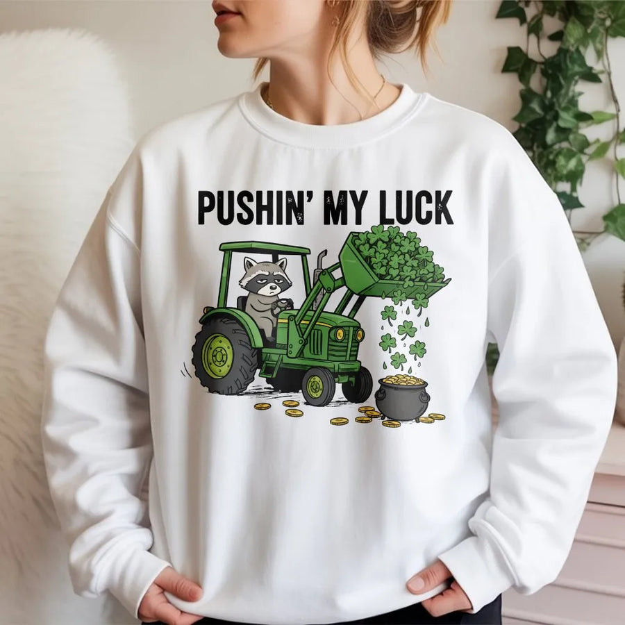 St Patrick's Day Raccoon Sweatshirt | Funny Tractor Graphic Design | Premium Cotton Blend | Gift for Farmers and Animal Lovers