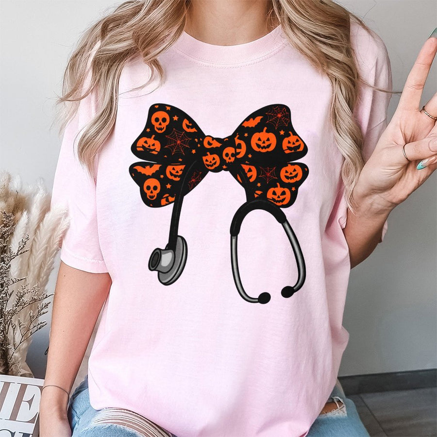 Nurse Halloween T-Shirt | Coquette Bow Stethoscope Design | Premium 100% Cotton Tee | Spooky Season Gift for Nurses, RNs, and Nursing Students