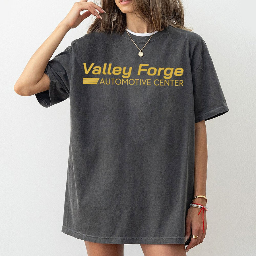 Valley Forge Automotive Center T-Shirt | Retro Mechanic Garage Logo | Premium Cotton Graphic Tee | Gift for Comedy Fans and Car Enthusiasts