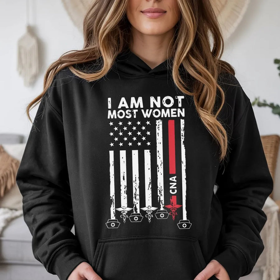 CNA Hoodie | I Am Not Most Women Nurse Gift | American Flag Healthcare Graphic Sweatshirt | Premium Cotton Blend | Nursing Assistant Apparel