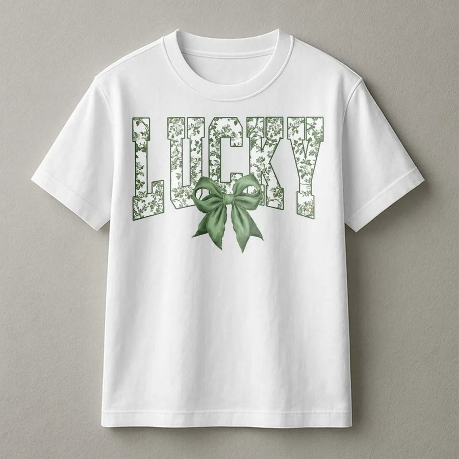 Lucky St. Patrick's Day T-Shirt | Floral Letter Graphic With Green Bow | Premium Soft Cotton | Festive Holiday Gift For Her