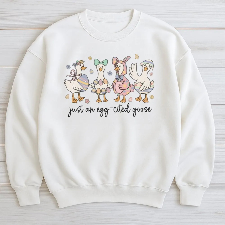 Just An Egg-Cited Goose Sweatshirt | Cute Easter Duck Graphic | Premium Cotton Blend Crewneck | Funny Animal Lover Spring Gift