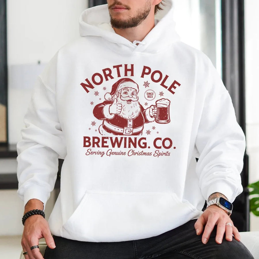 North Pole Brewing Co Hoodie | Funny Santa Drinking Beer Graphic | Premium Cotton Blend Unisex Sweatshirt | Christmas Party Gift for Him or Her