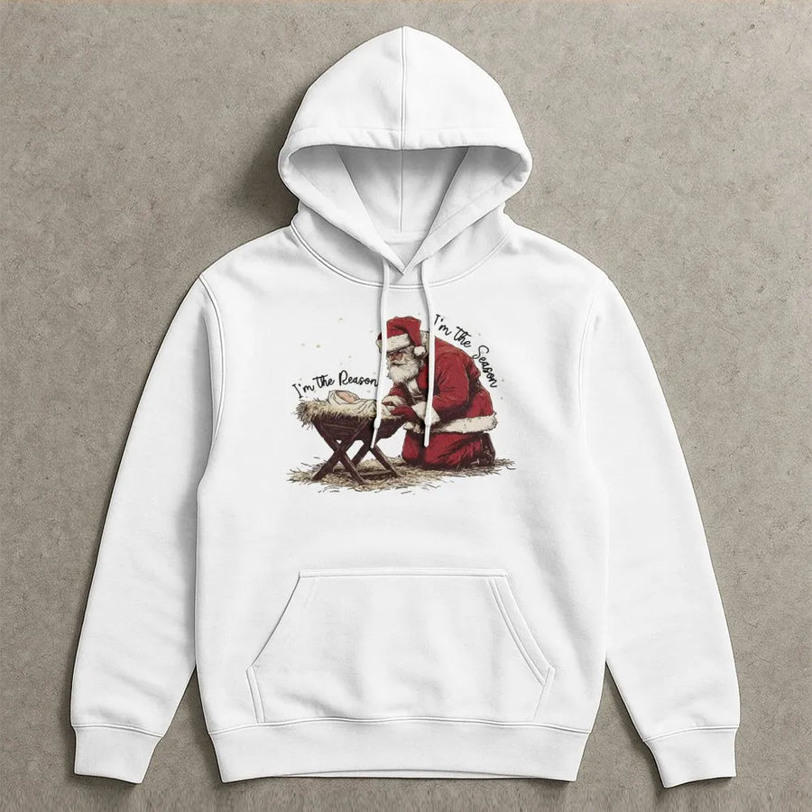 Jesus Is The Reason Christmas Hoodie | Santa Kneeling at Nativity Scene | Soft Cotton Blend Sweatshirt | Christian Holiday Gift for Men Women