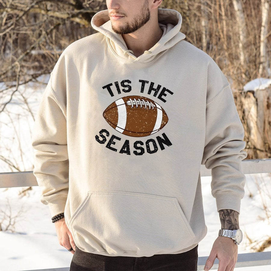 Tis The Season Football Hoodie | Distressed Fall Sports Graphic | Soft Cotton-Polyester Blend | Trendy Game Day Apparel Gift for Football Fans