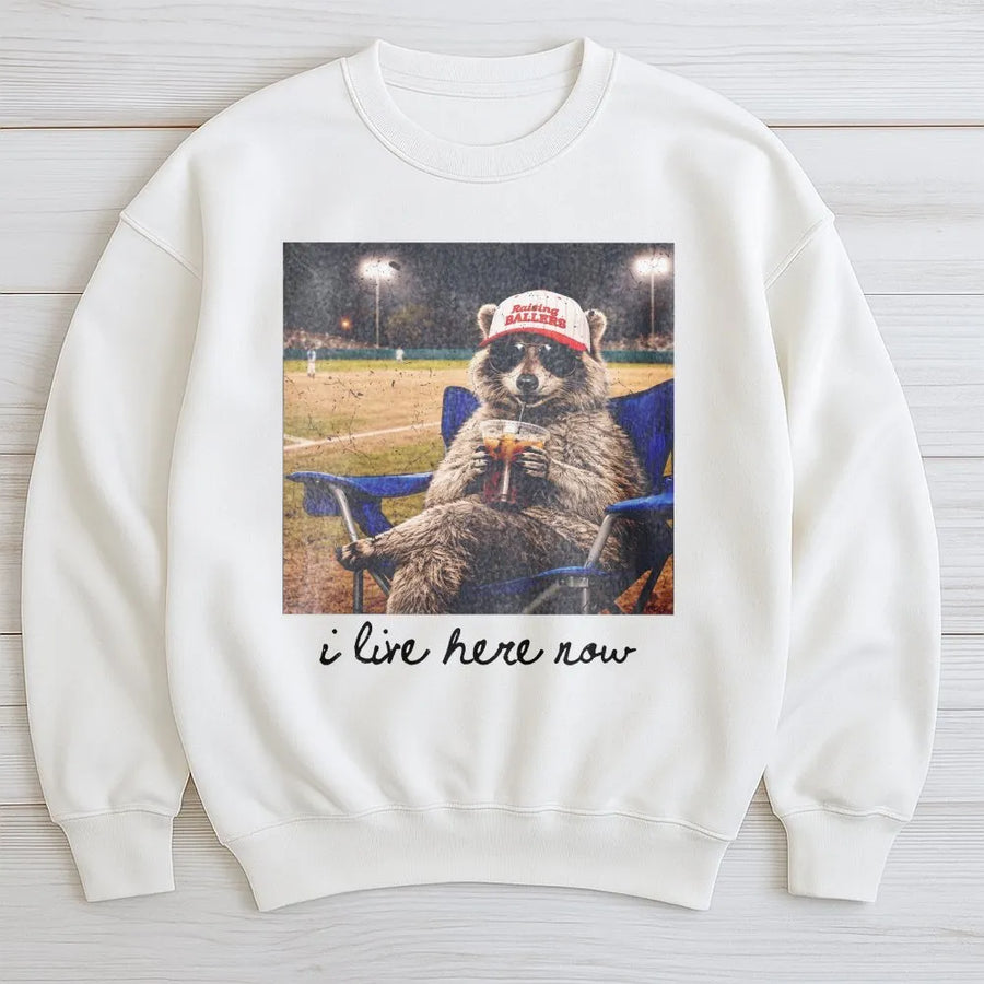 Funny Raccoon Baseball Mom Sweatshirt | I Live Here Now Vintage Ballpark Graphic | Premium Cotton Blend | Gift for Softball Mama