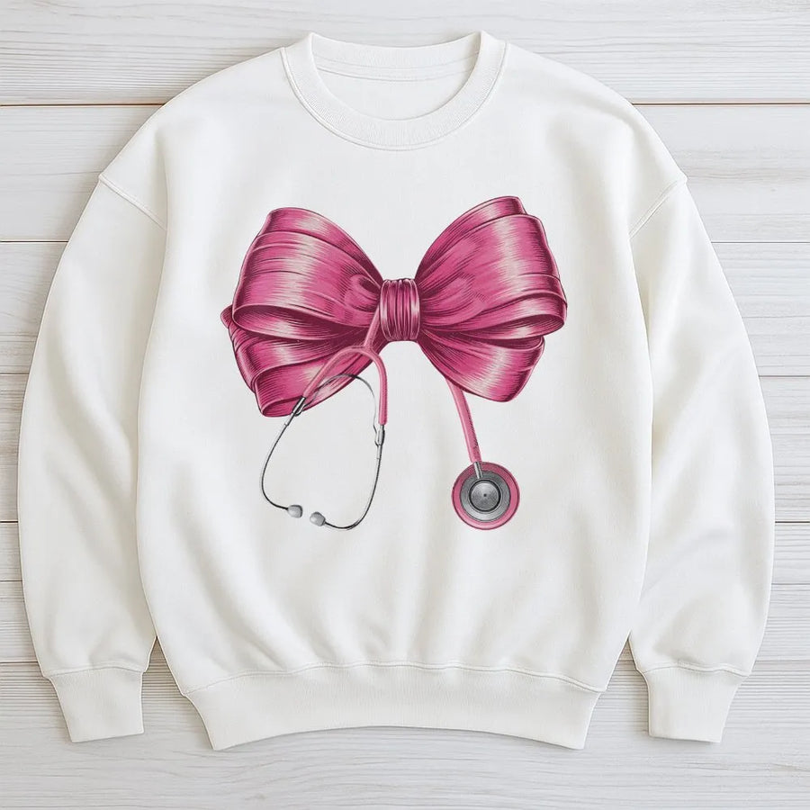 Coquette Nurse Stethoscope Sweatshirt | Aesthetic Pink Bow Medical Graphic | Premium Cotton Blend Crewneck | Gift for Nursing Student & Healthcare Worker