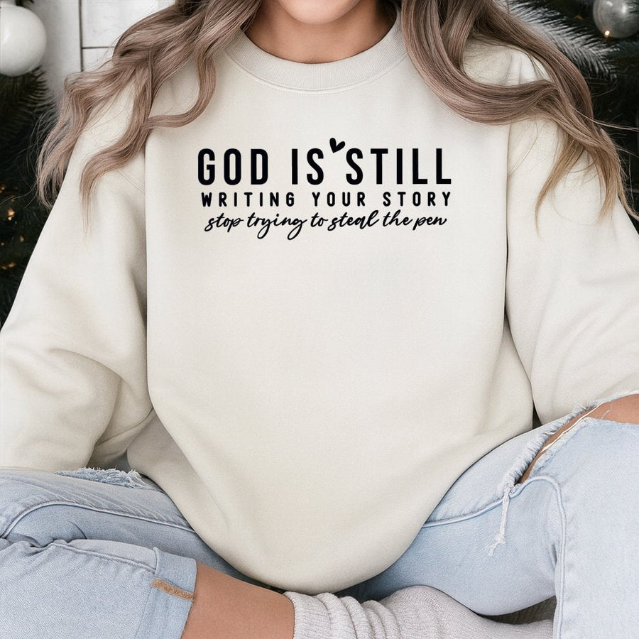 God Is Still Writing Your Story Sweatshirt | Christian Faith Quote Apparel | Premium Cotton Blend Crewneck | Religious Gift for Women and Men