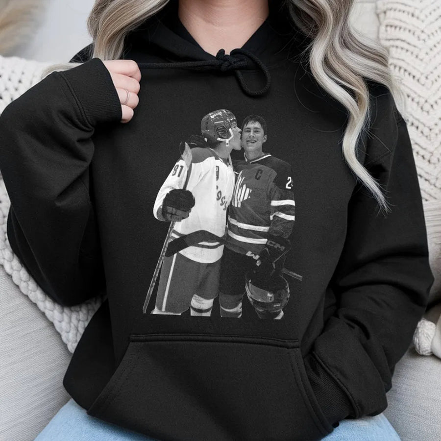 Hockey Player Kissing Hoodie | Graphic Sports Couple Illustration | Premium Cotton-Poly Blend | Fan Gift for Hockey Lovers and Athletes