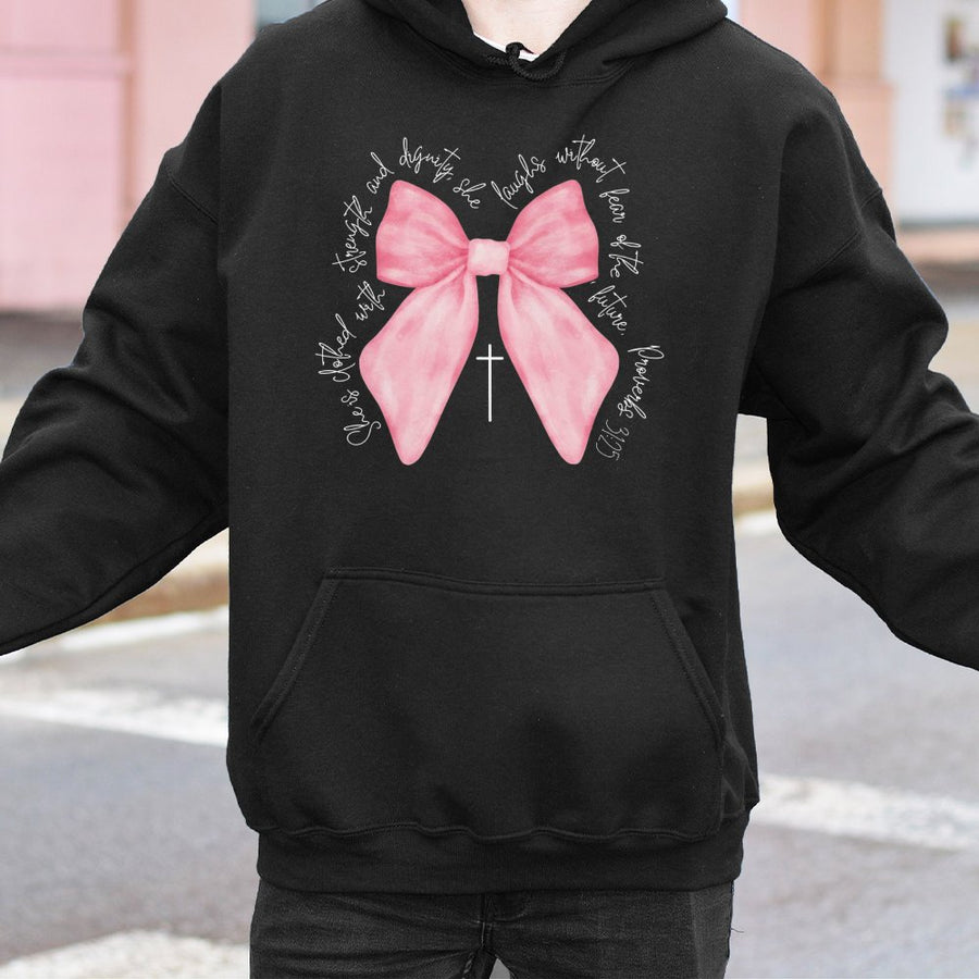 Proverbs 31:25 Hoodie | Coquette Pink Bow Graphic | Cotton-Poly Blend Comfort | Christian Faith Gift for Women