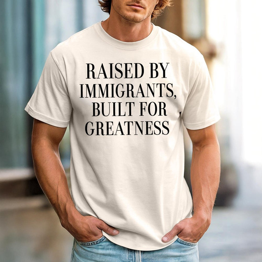 Raised By Immigrants T-Shirt | Built For Greatness Quote Graphic Tee | 100% Cotton Premium Unisex Shirt | Meaningful Gift For First Generation Americans