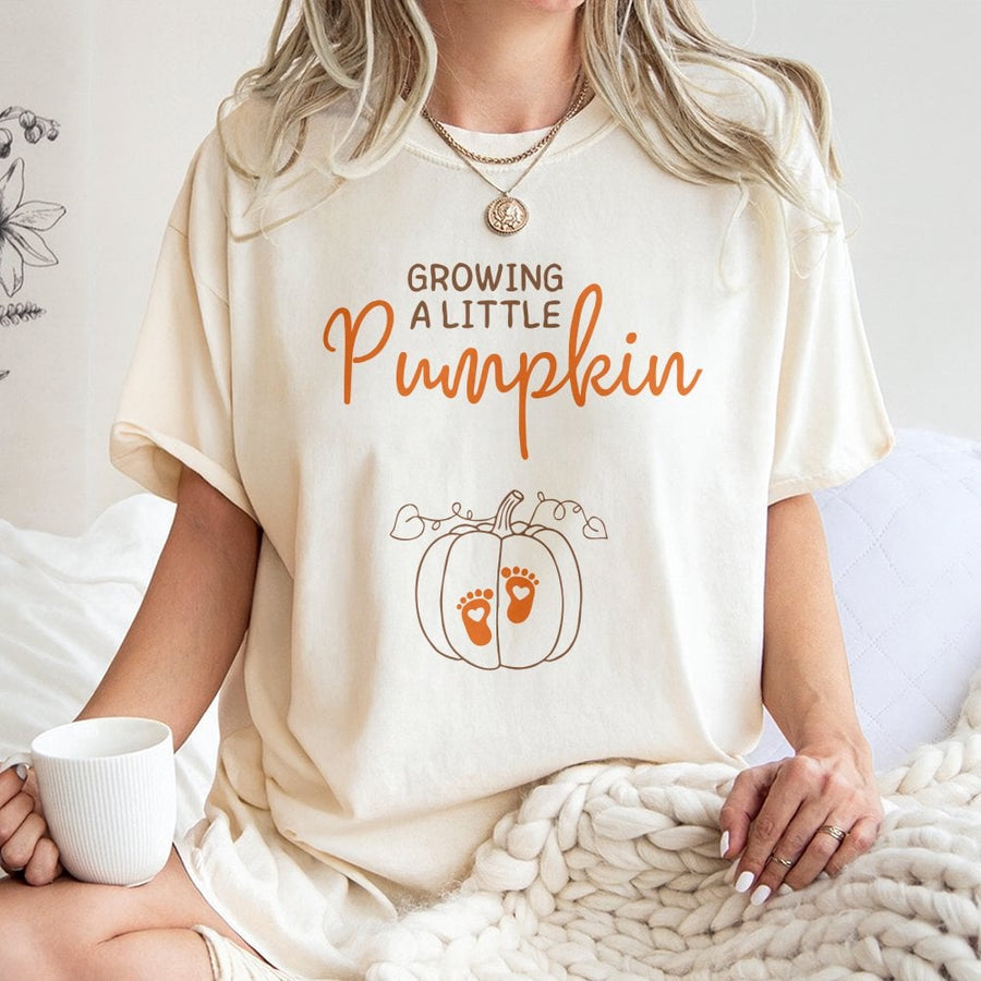 Growing A Little Pumpkin T-Shirt | Fall Pregnancy Announcement Graphic | 100% Cotton Premium Tee | Cute Thanksgiving Baby Reveal Gift For Mom