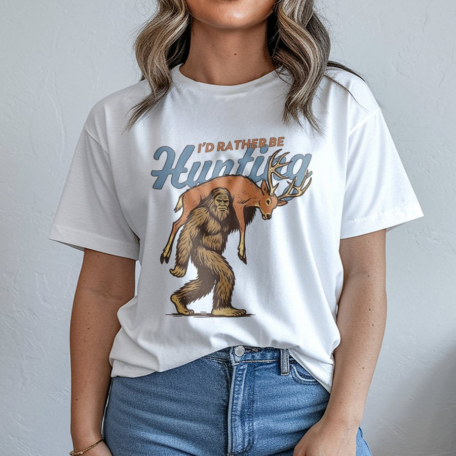 Bigfoot Hunting T-Shirt | Sasquatch Carrying Deer Graphic | Premium Cotton Unisex Tee | Funny Outdoorsman Gift for Hunters