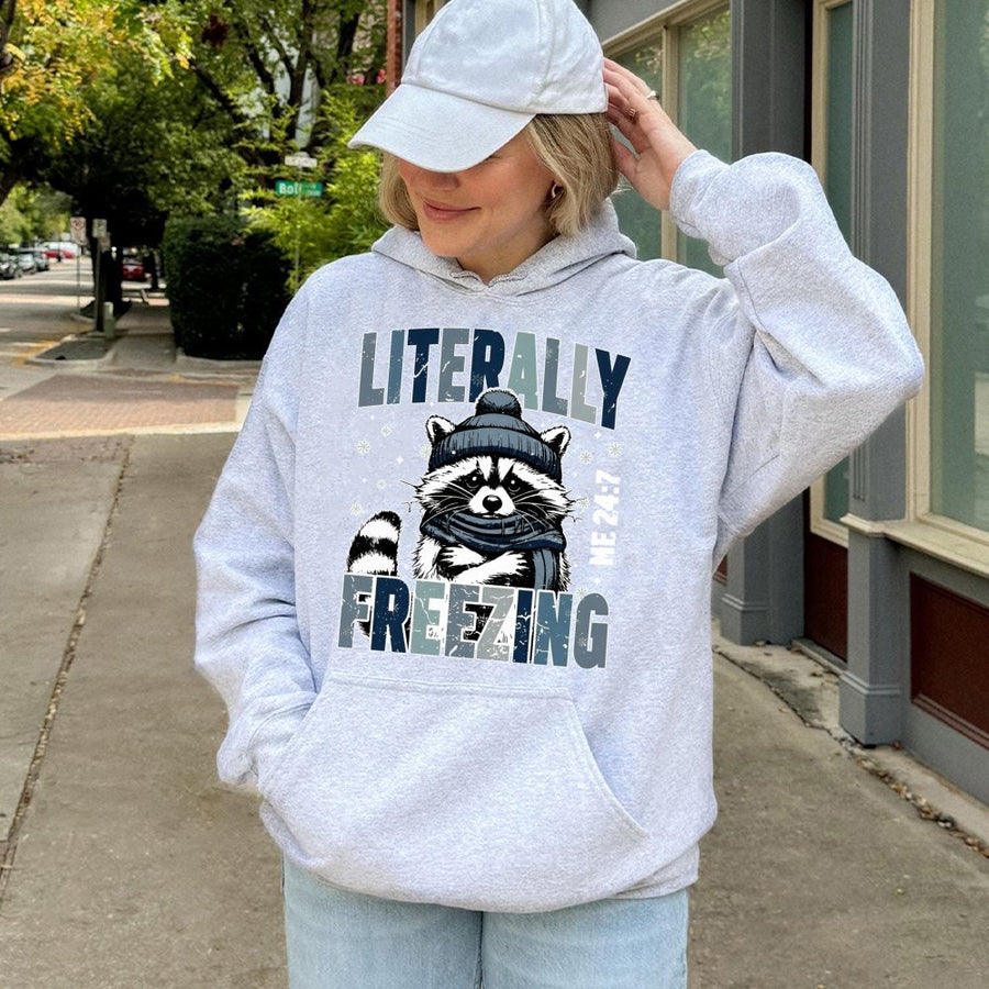 Literally Freezing Raccoon Hoodie | Cute Winter Animal Graphic | Premium Cotton Blend | Funny Holiday Gift for Animal Lovers