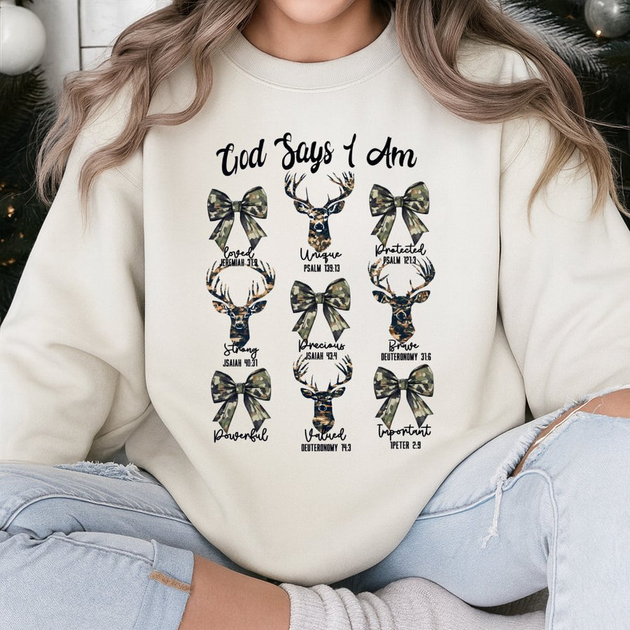 God Says I Am Bible Verse Sweatshirt | Camo Deer & Coquette Bow Graphic | Premium Cotton Blend | Faith Based Christian Gift for Women