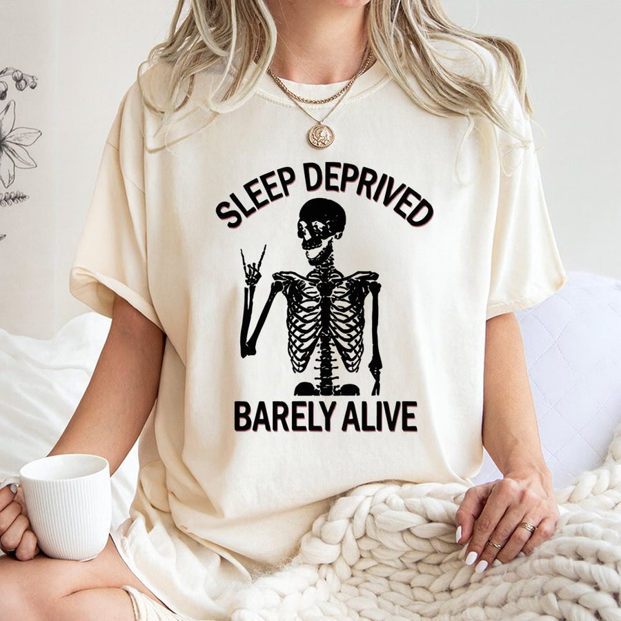 Sleep Deprived Barely Alive T-Shirt | Funny Skeleton Rock Hand Graphic | 100% Cotton Premium Tee | Sarcastic Gift for Tired Adults