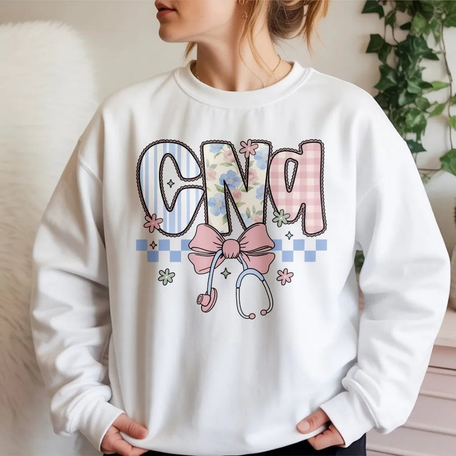 CNA Nurse Sweatshirt | Coquette Floral Stethoscope Bow Graphic | Soft Cotton Blend | Nurses Week Appreciation Gift for Certified Nursing Assistant