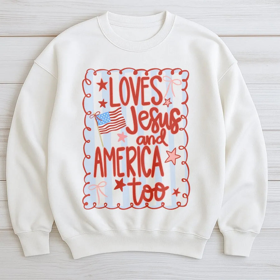 Loves Jesus and America Too Sweatshirt | Patriotic Coquette Bow Graphic | Premium Unisex Pullover | 4th of July Christian Gift for Her