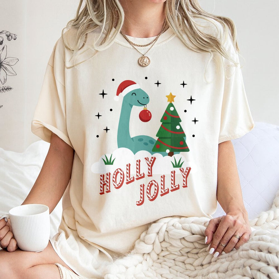 Holly Jolly Dinosaur Christmas T-Shirt | Cute Festive Dino Holiday Graphic Tee | Premium 100% Cotton | Unisex Gift for Family Matching Vacation