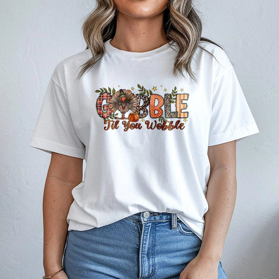 Gobble Til You Wobble T-Shirt | Cute Thanksgiving Turkey Graphic Tee | Premium Soft Cotton Blend | Funny Autumn Holiday Gift For Family