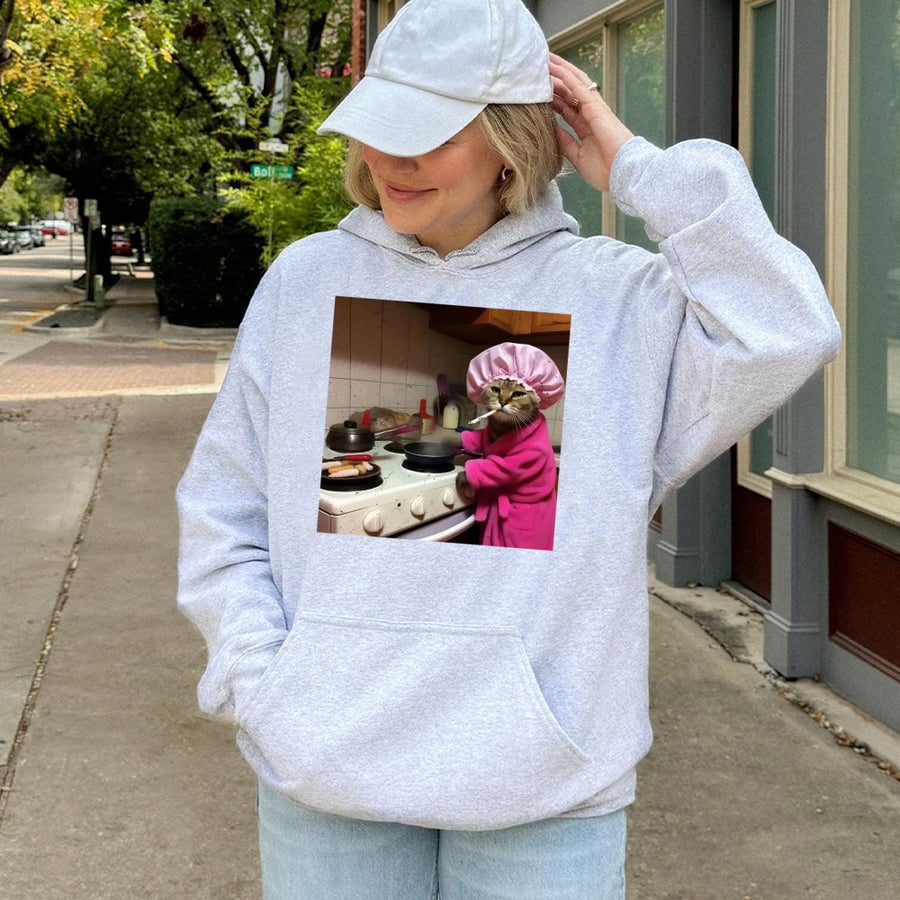 Cooking Cat Hoodie | Sassy Kitty In Pink Bathrobe Graphic | Premium Cotton Blend | Funny Animal Gift For Cat Lovers And Meme Fans
