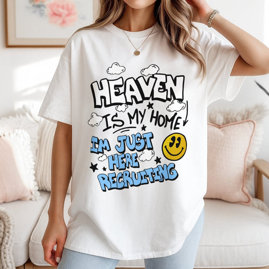 Heaven Is My Home Graphic T-Shirt | Retro Smiley Face Christian Design | Premium 100% Cotton Tee | Faith-Based Religious Gift for Him and Her
