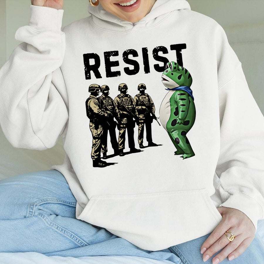 Resist Frog Hoodie | Activism Protest Graphic | Premium Cotton-Blend Apparel | Unisex Cozy Gift for Social Justice Advocates